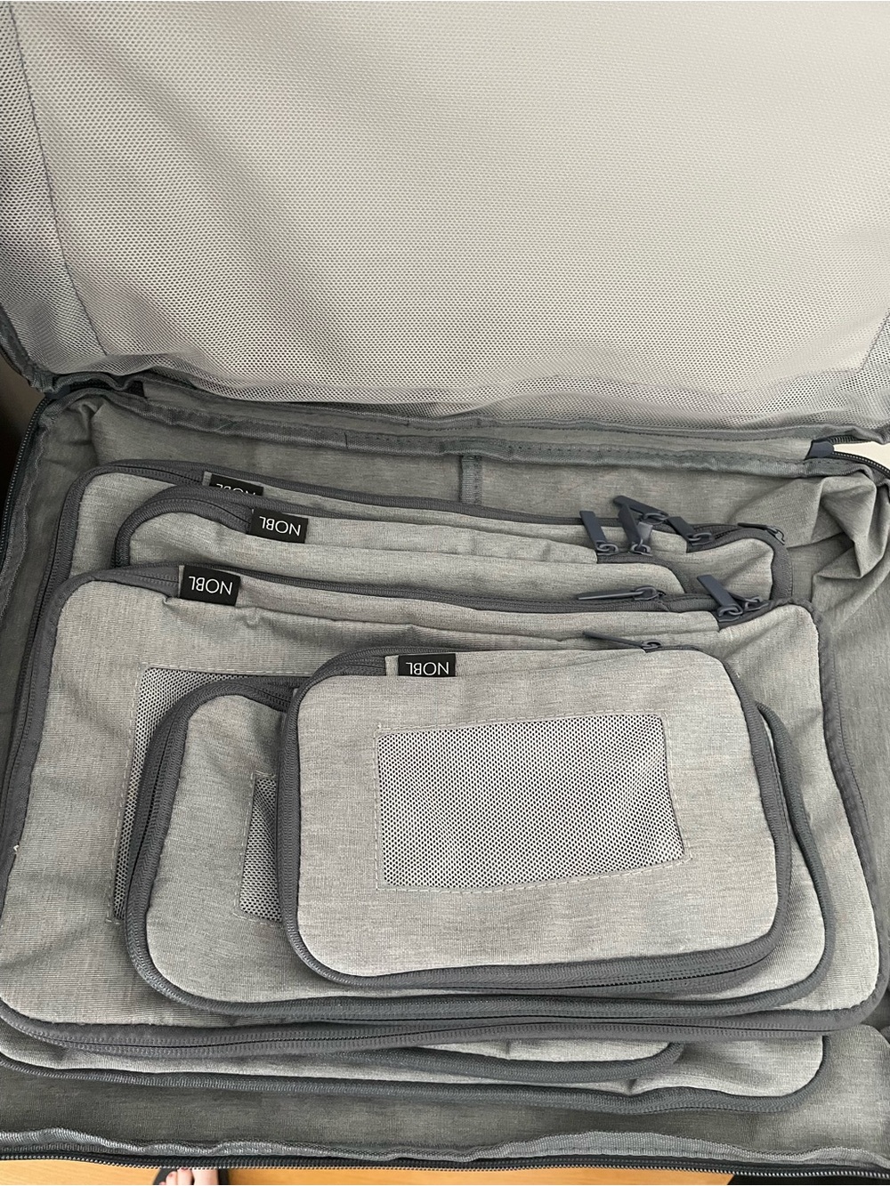 Nobl compressible packing cubes (6 pieces). Grey/silver. NWT - still compressed!
